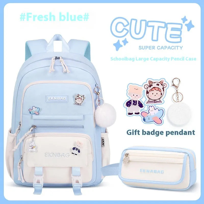 Pink waterproof Oxford cloth school backpack for girls with curved shoulder straps on a white background.