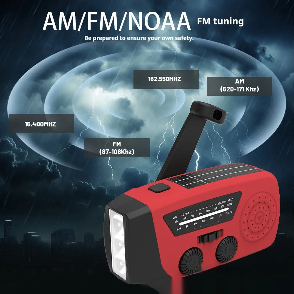 Red rechargeable handheld torch and radio unit with wrist strap and USB charging port.