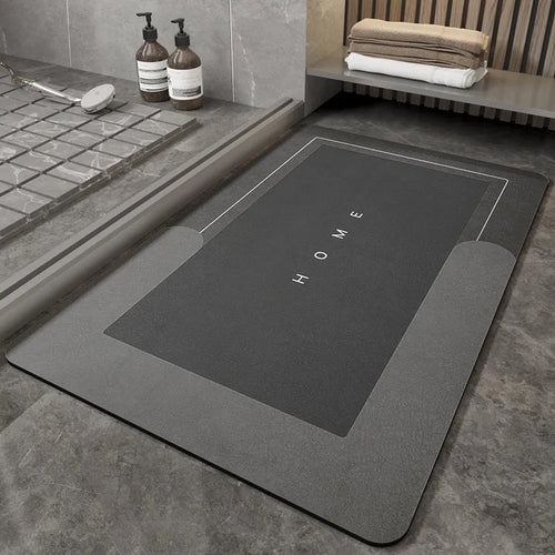 Blended fabric bathroom floor mat in oval and rectangular shapes on a tiled floor