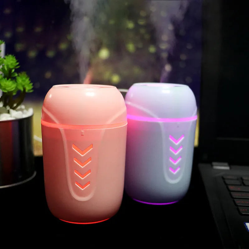 X3 portable car humidifier in columnar shape, shown in blue, pink, and white colour options.