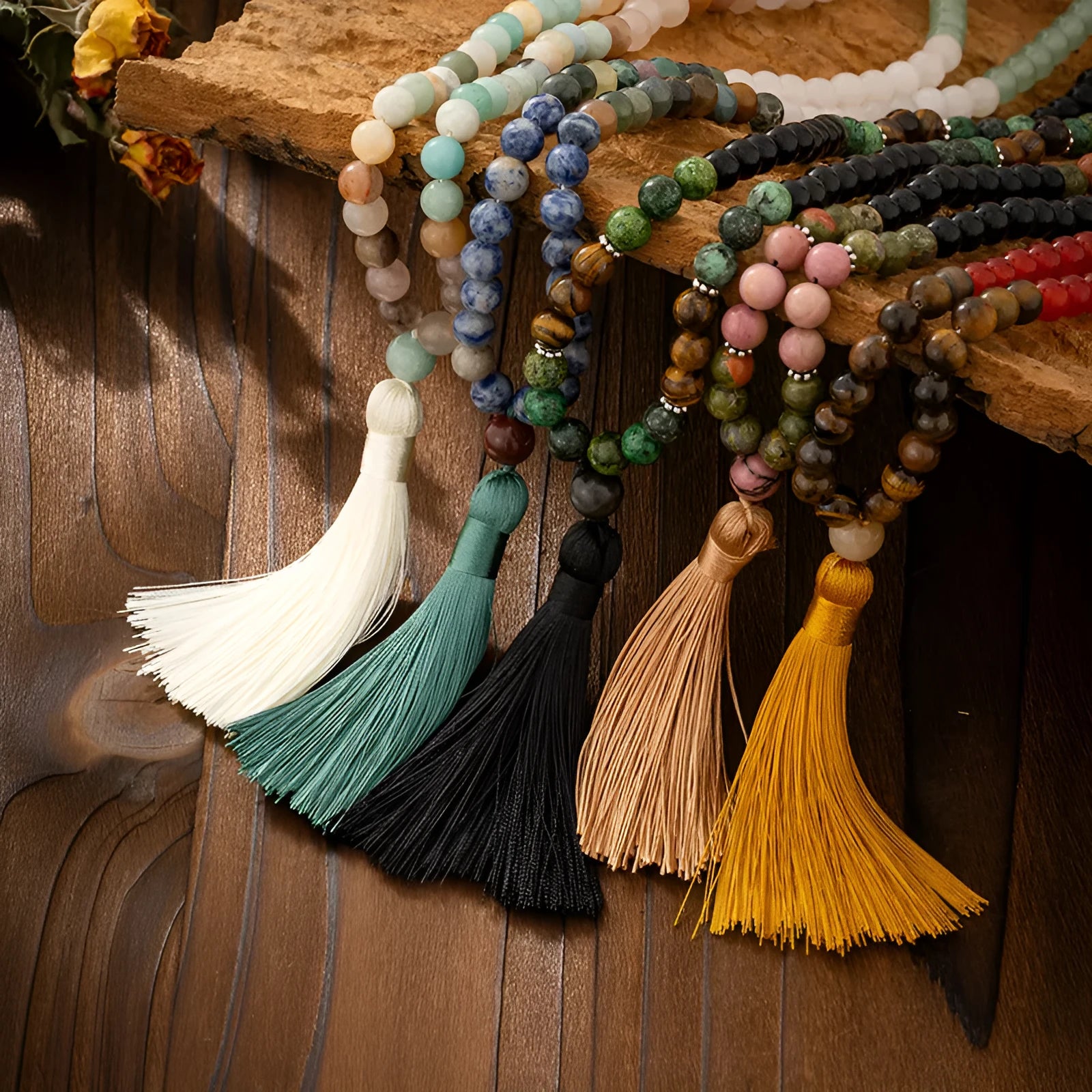 Vintage bohemian style natural stone bead necklace and bracelet set showing geometric round beads and tassel detailing