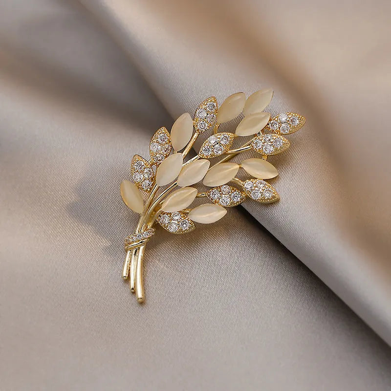 Alloy brooch in natural flower shape with electroplated finish, featuring adjustable and anti-exposure pin closure for women's coats and suits.
