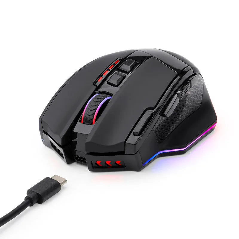 Black Redragon M801P dual-mode wireless and wired gaming mouse on a desk