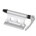 Silver metal quick release fixing clamp for a bicycle front fork.