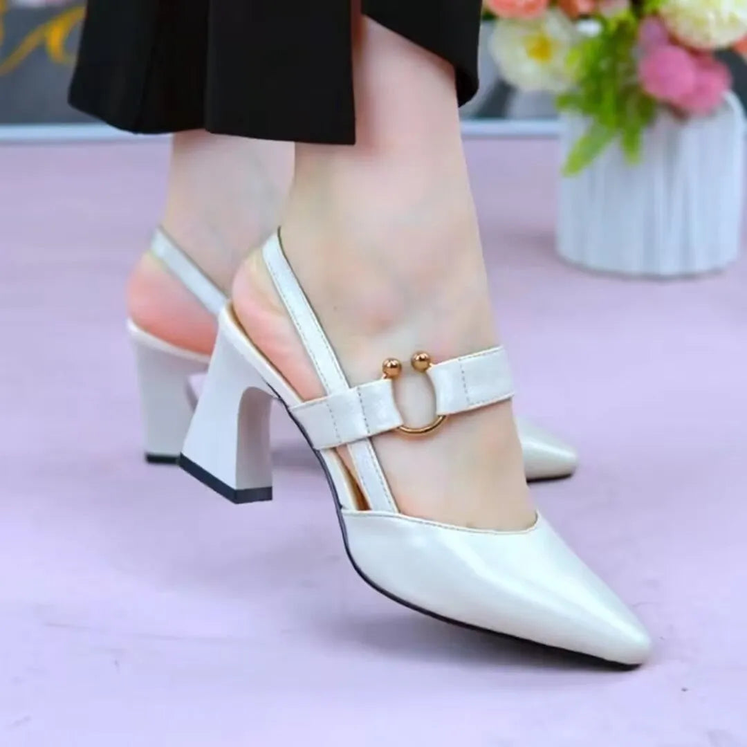 Women's apricot coloured pigskin leather sandals with a closed toe, backless design and a chunky heel.