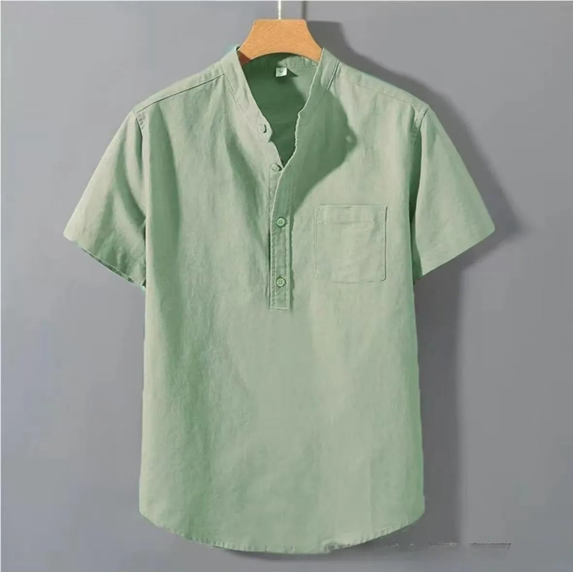 Men's beige casual stand collar short sleeve shirt made from slub linen blend fabric.