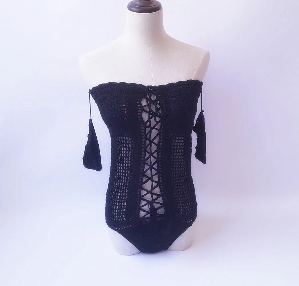 Women's off-the-shoulder one-piece swimsuit in light pink on a mannequin