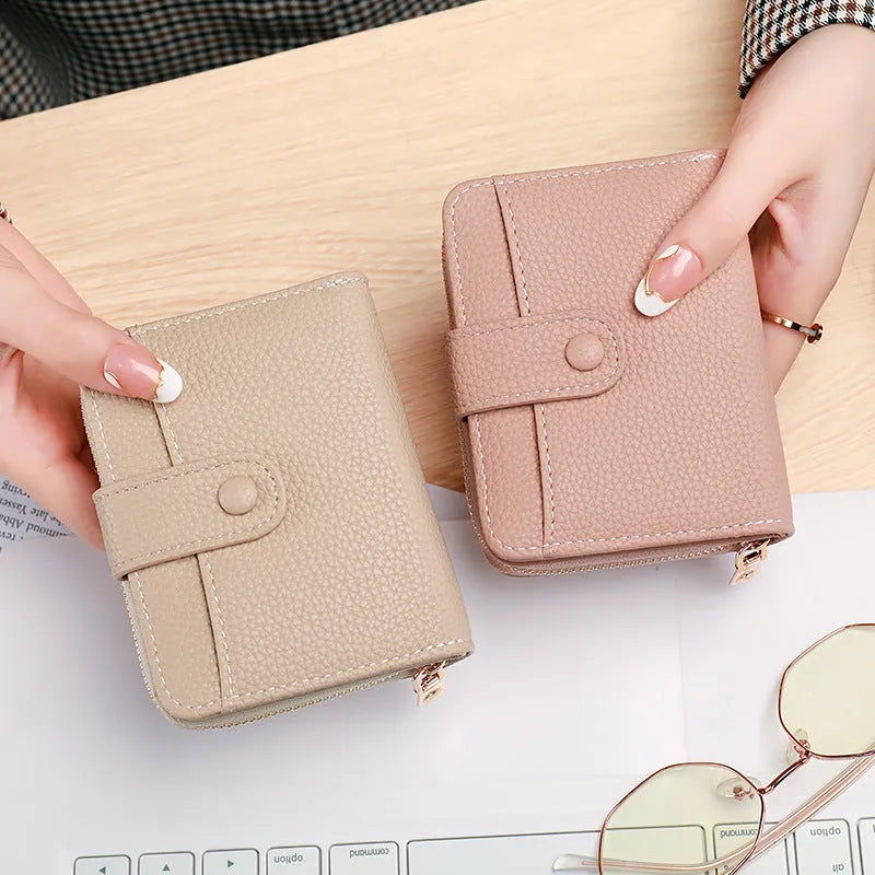 Ladies' short wallet with lychee pattern in beige, pink, black, and red colour options showing two-fold design