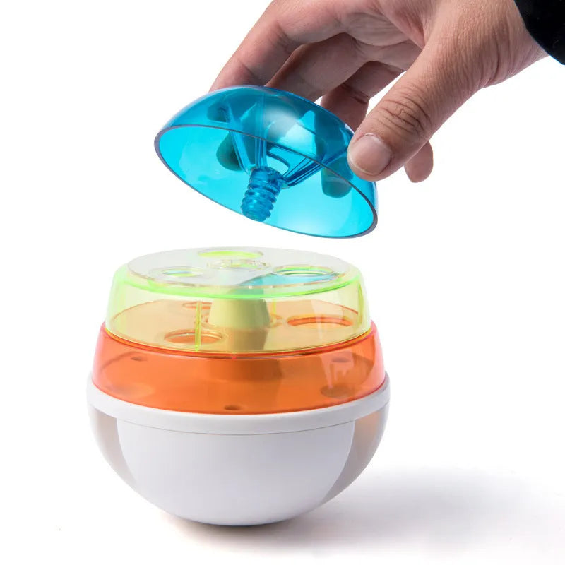 Dog leak food toy ball in photo colour, non-slip base, 12.5cm bottom diameter, on a plain background