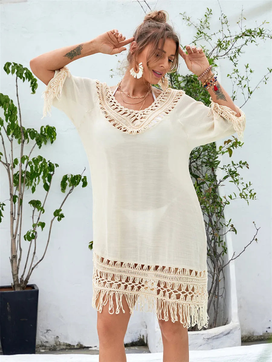 Apricot-coloured women's long hand-crocheted beach dress with a lining, shown as a swimsuit cover-up.