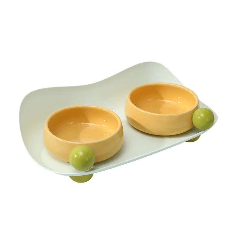 Pink double elevated ceramic pet bowl with non-slip base for cats and small dogs