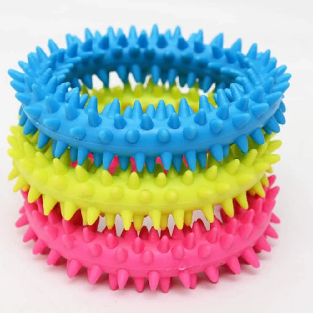Blue spiked circle ring dog chew toy made from TPR for dental cleaning and bite training.