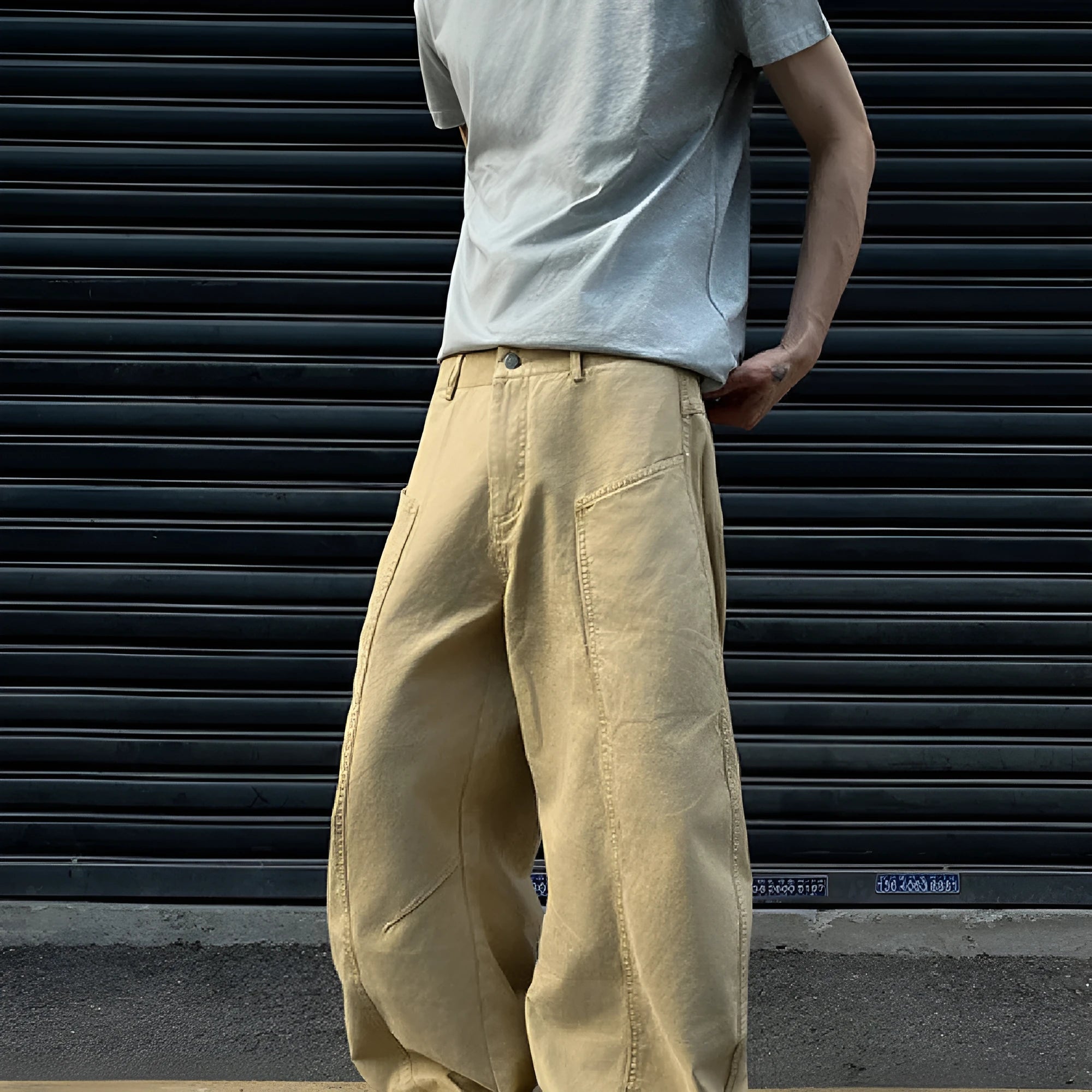 Men's khaki cotton straight-leg trousers showing American retro styling and solid colour