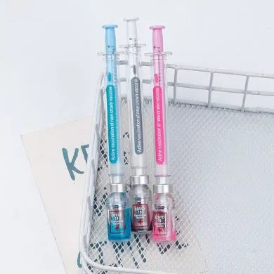 Vaccine pen design gel pen with black refill showing retractable click mechanism and 0.5mm needle tube point
