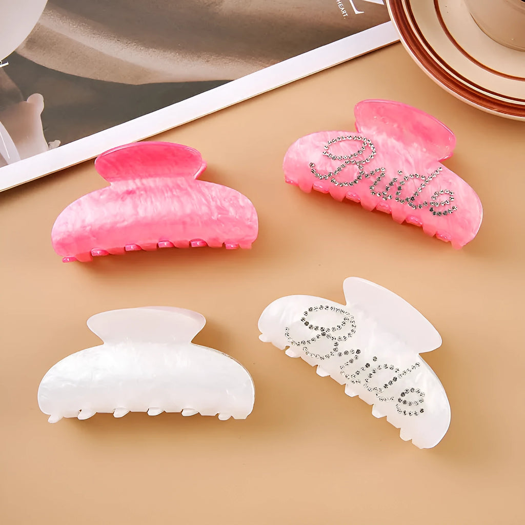10cm long acrylic shower shark hair clip with diamond spot drill decoration in pink colour with back clip mechanism.