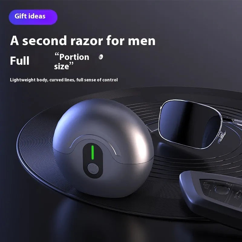 Black and grey portable waterproof magnetic shaver with brushless motor and removable cutter head