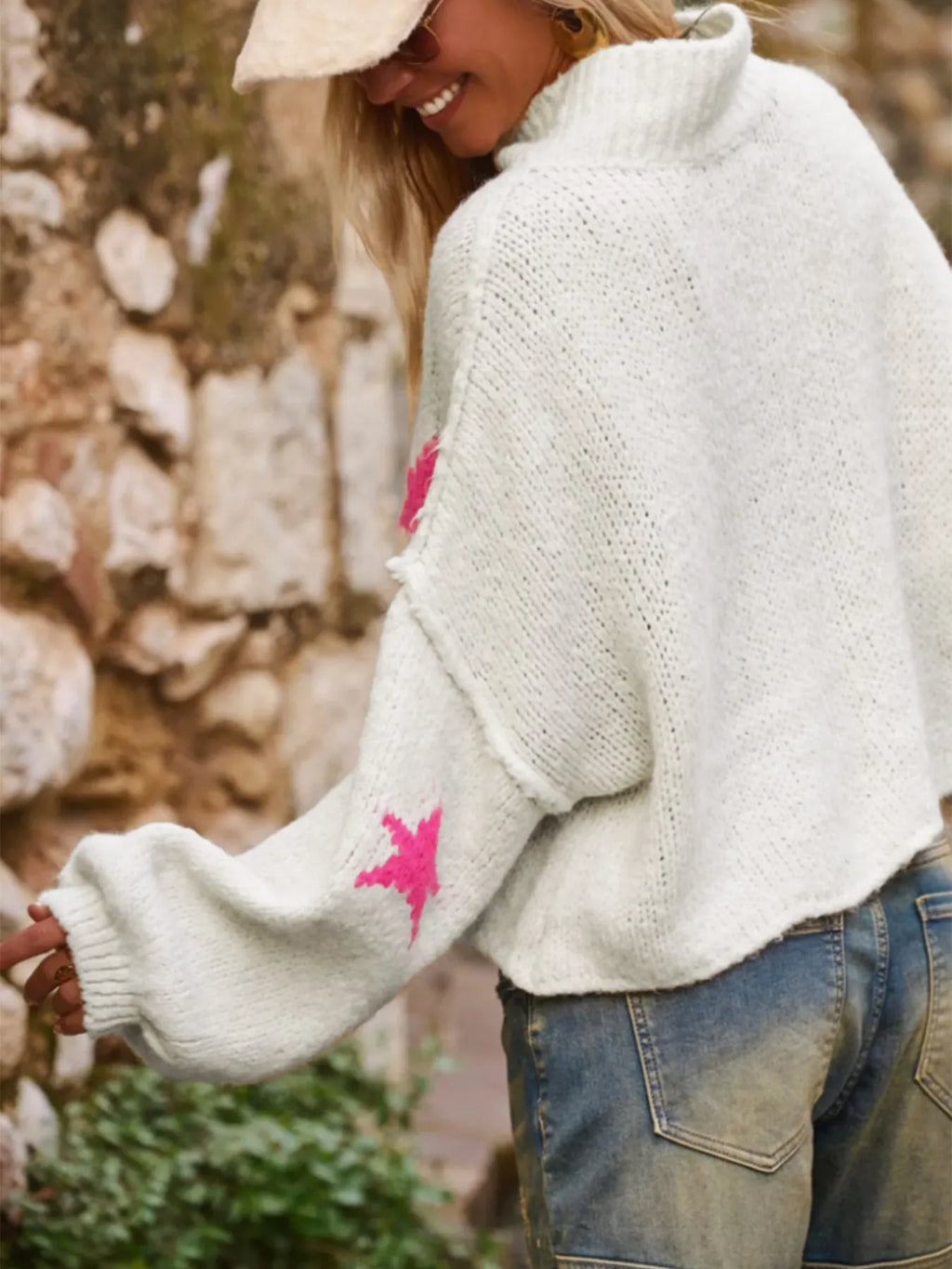 White women's loose turtleneck pullover sweater with five-pointed star pattern