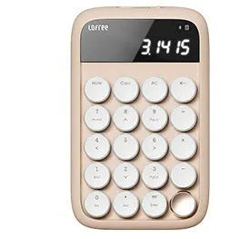 Liquid Foundation wireless 84-key mechanical keyboard, mouse, pick-up light, and Bluetooth calculator set on a desk.