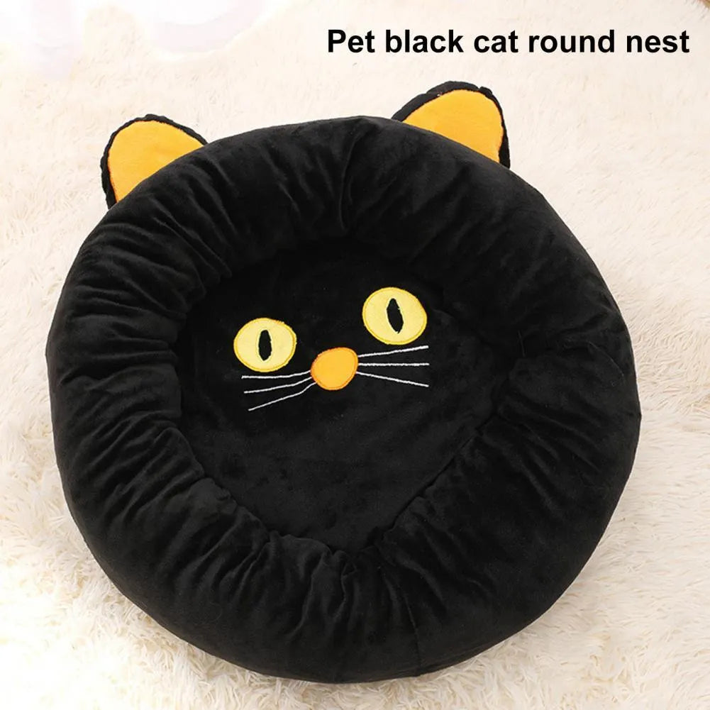 Black cat shape velvet pet nest bed with raised edges, 50cm diameter, on floor