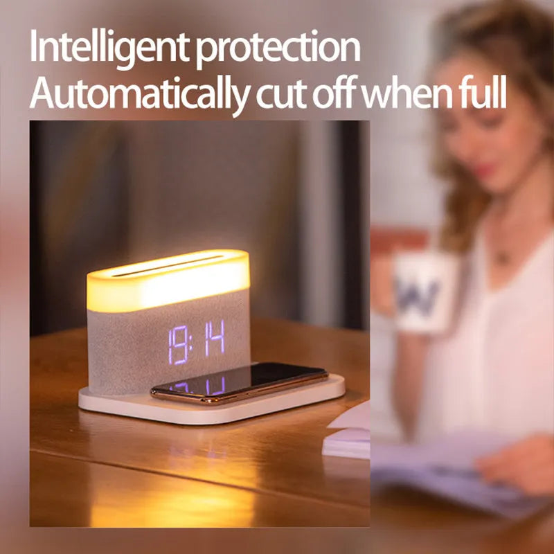 Black and white minimalist wireless charging station with digital clock, night light, and thermal cup.