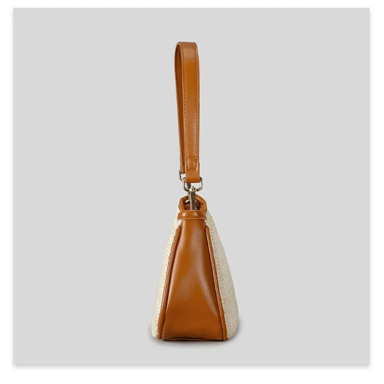 Khaki hand-woven straw selenodont crossbody bag made from PP grass with contrast colour detailing and single shoulder strap.