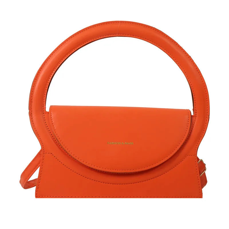 PU leather messenger bag in horizontal square shape with sandwich pockets and stitching details