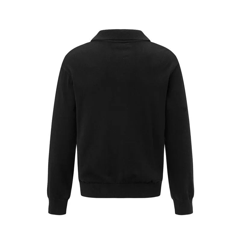 Man wearing a loose black chemical fibre blend pullover sweater for casual leisure