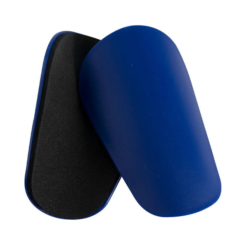 PU mini shin guards for football and sports, shown in black, white, red, and blue colours.