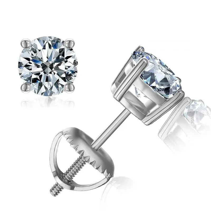 Silver four-claw set moissanite stud earrings with geometric shape and screw-back fittings.