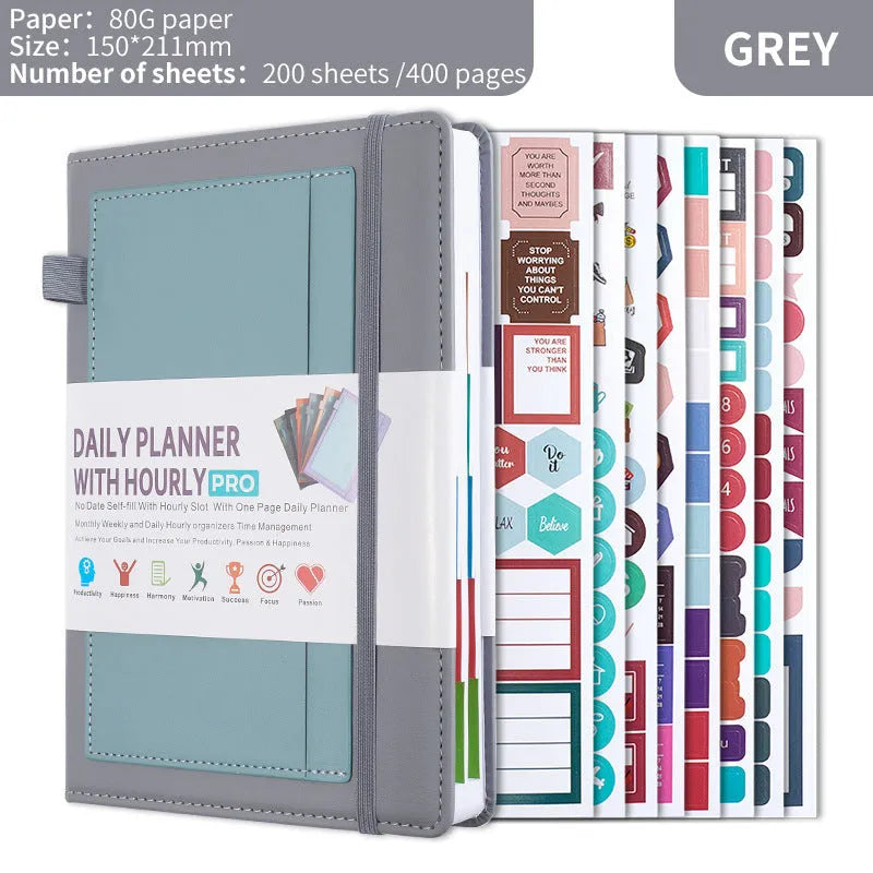 Creative trend undated notebook with strap closure in purple, available with planning stickers.