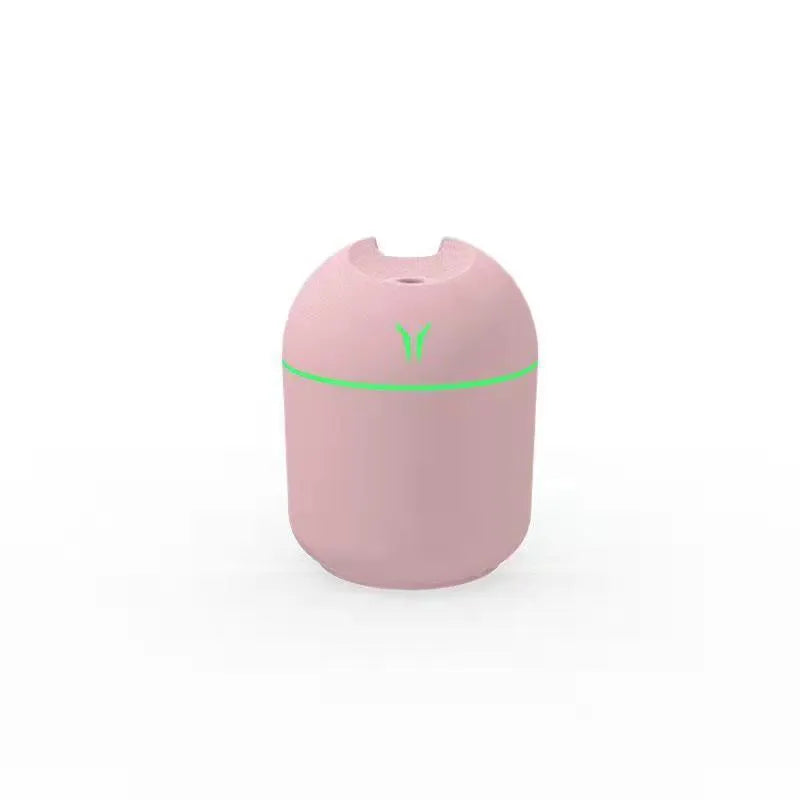 Round desktop humidifier with USB cable in ivory white, sky blue, and girlish pink colour options