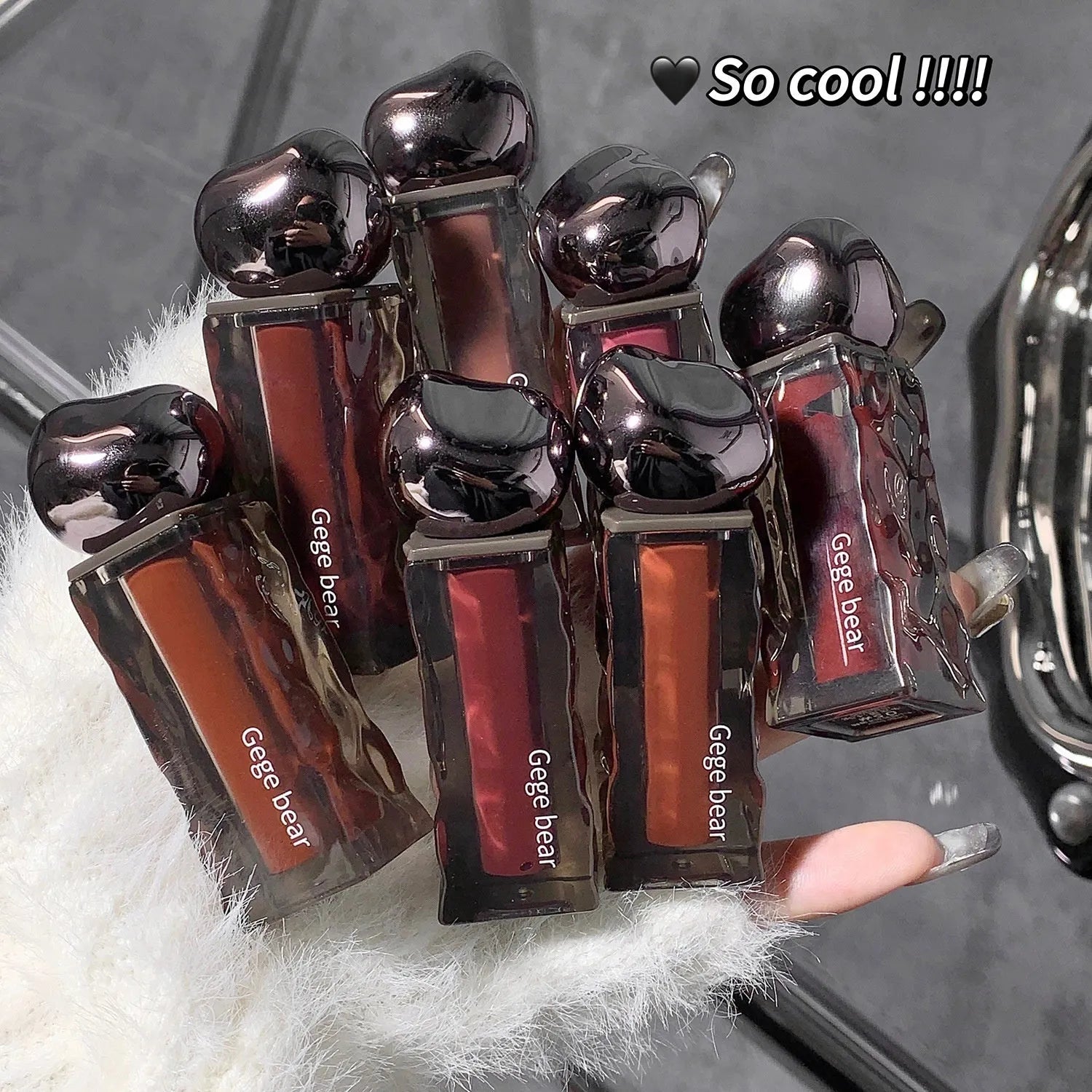Glacier Lava Lip Lacquer cosmetic product in water-light mirror finish with seven shade number options