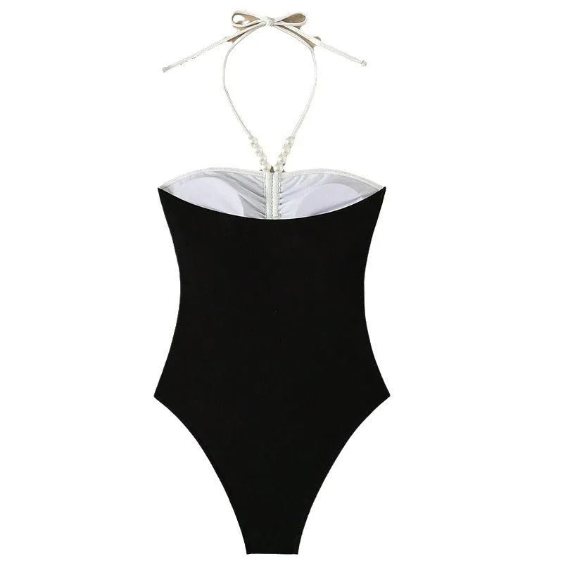 Women's black or white one-piece swimsuit with pearl spaghetti straps for swimming