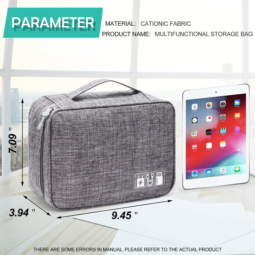 Black travel cable organiser bag open, showing mesh pockets, elastic loops, and removable padded dividers inside.
