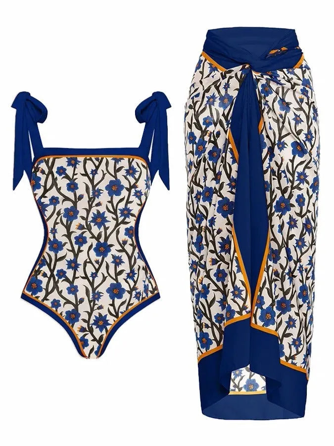 Women's two-piece floral printed polyester swimsuit with matching hip skirt in conservative style