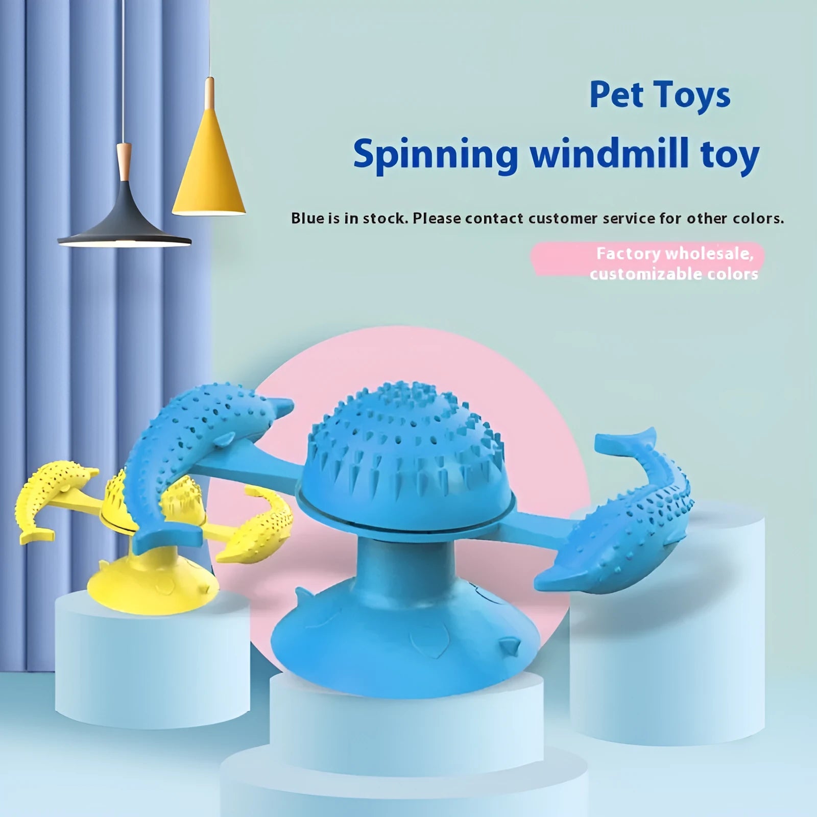 Blue rubber windmill cat toy on floor showing spinning mechanism and 15 cm size