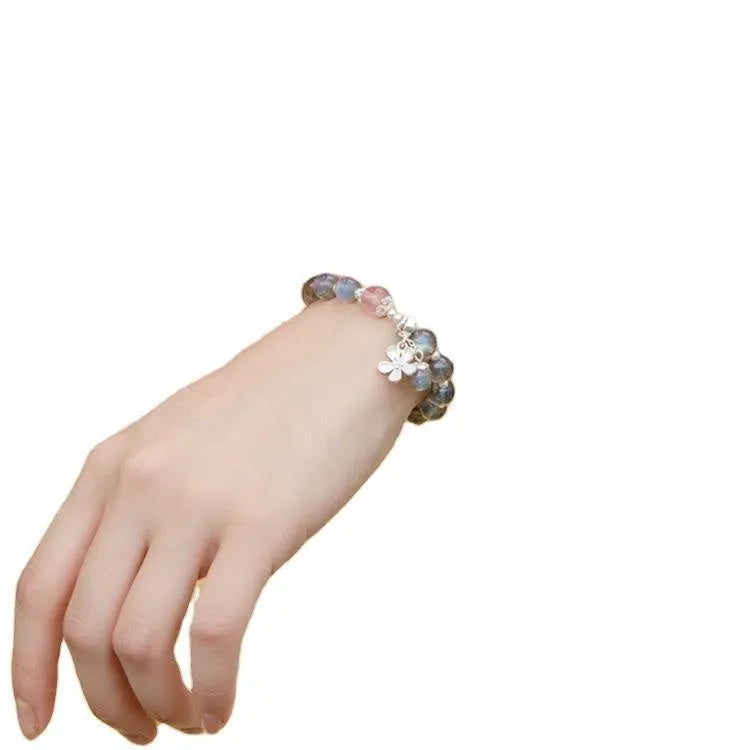 Women's 925 silver bracelet with grey moonlight and strawberry crystal beads measuring 7.5mm with honeysuckle design