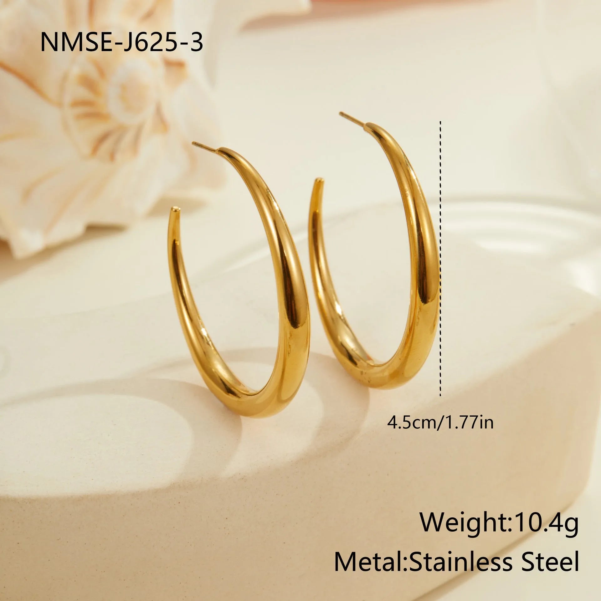 Women's stainless steel hoop earrings with 18K PVD gold plating in geometric round design