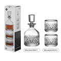 Stackable engraved glass wine glasses and sake barrel on a table
