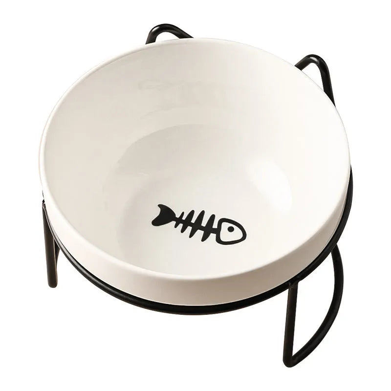 White ceramic cat bowl with decorative patterns on iron frame with cat ear details