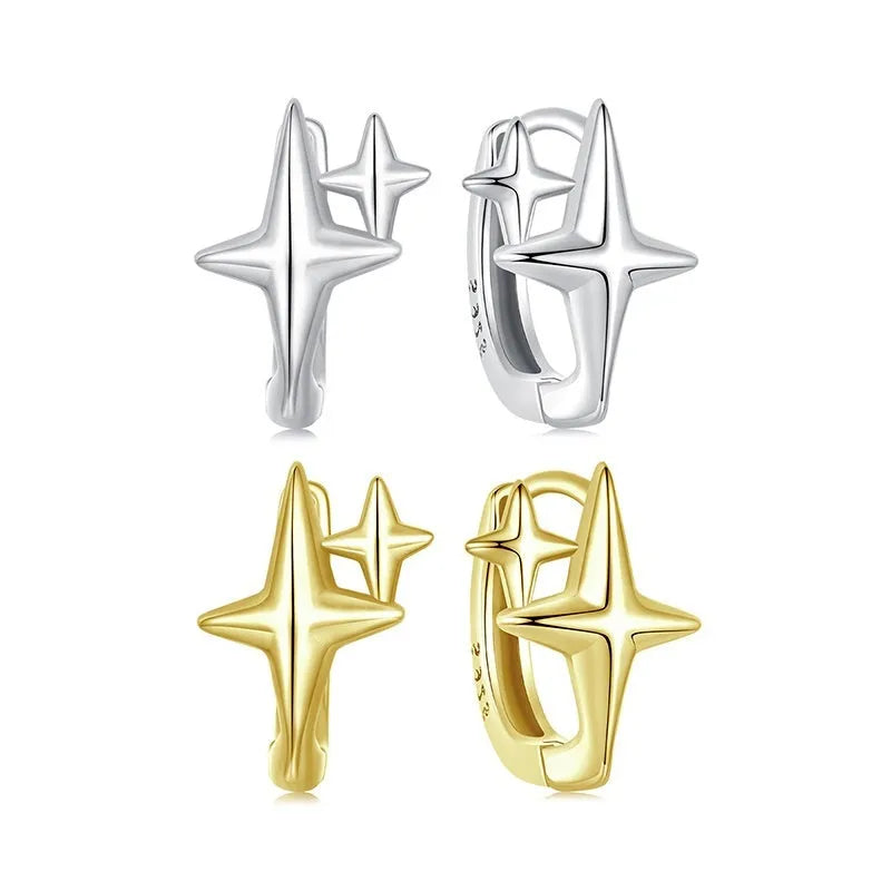 Minimalist oxidised sterling silver star clip earring with a single cubic zirconia stone.