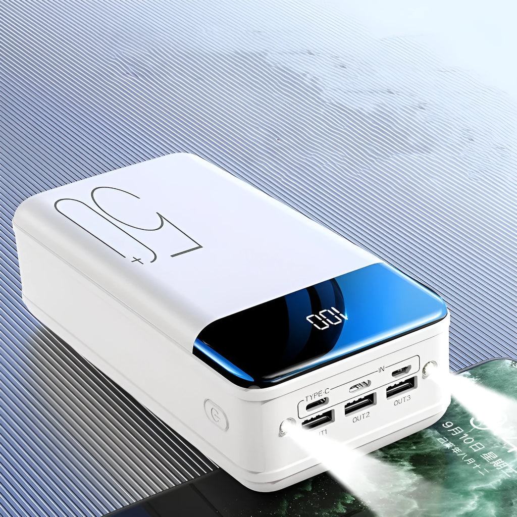 Large 50000mAh capacity power bank with three output ports in black or white plastic casing