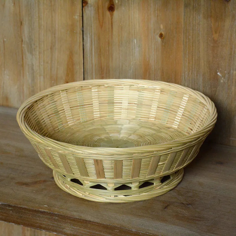 Handmade bamboo storage basket in woven construction showing three size options