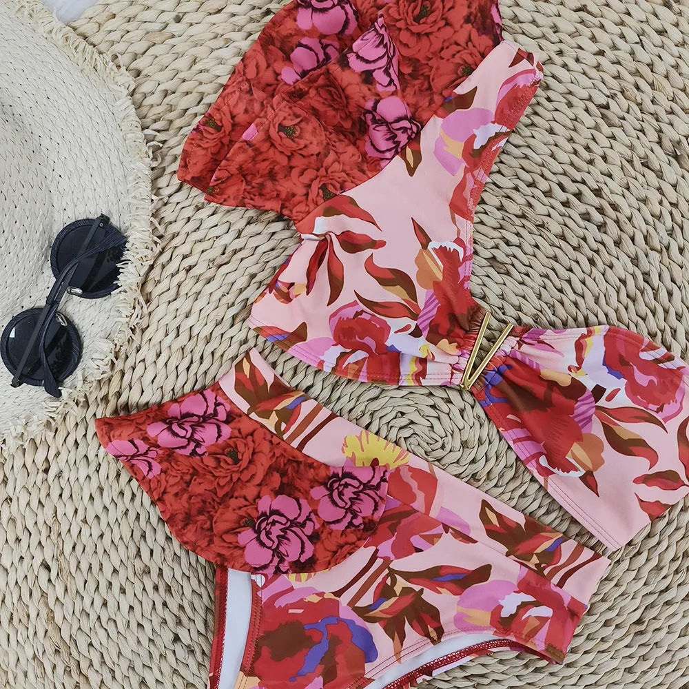Women's pink one-shoulder ruffled swimsuit with red flowers and high-waist bikini briefs