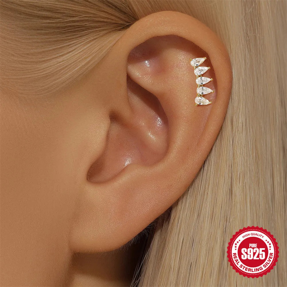 S925 sterling silver geometric moon and star earrings with cubic zirconia stones in a gold tone finish.