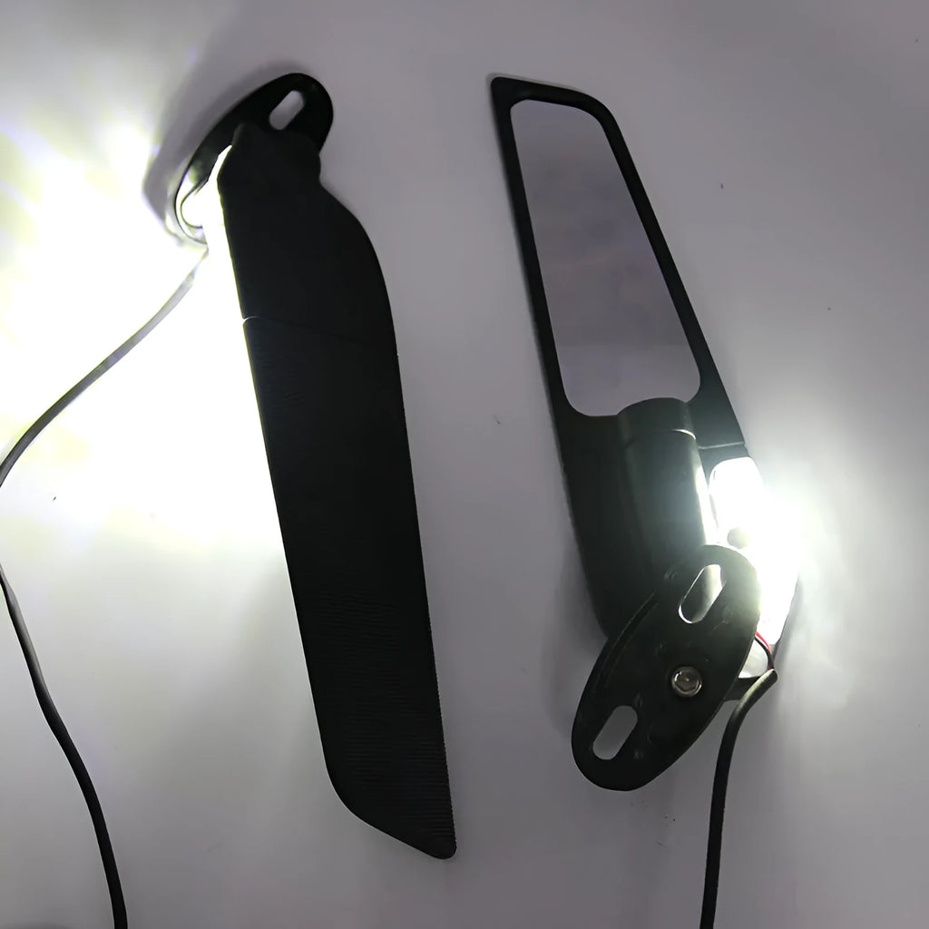 Pair of yellow motorcycle reflectors with convex glass lenses and aluminium alloy bodies for spoiler or mirror mounting.