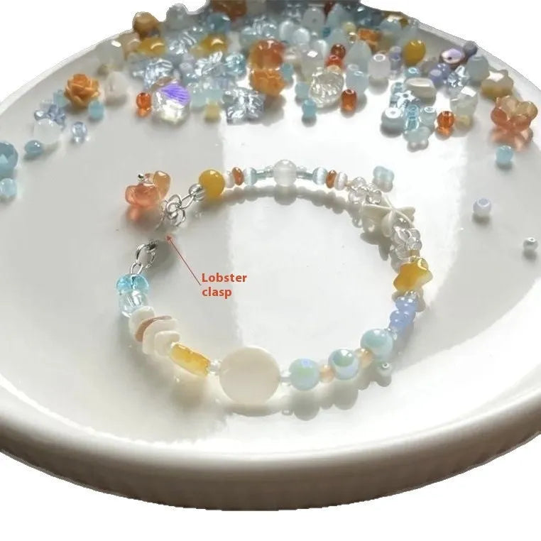 Orange sea colour diamond bracelet with round accents on adjustable alloy band