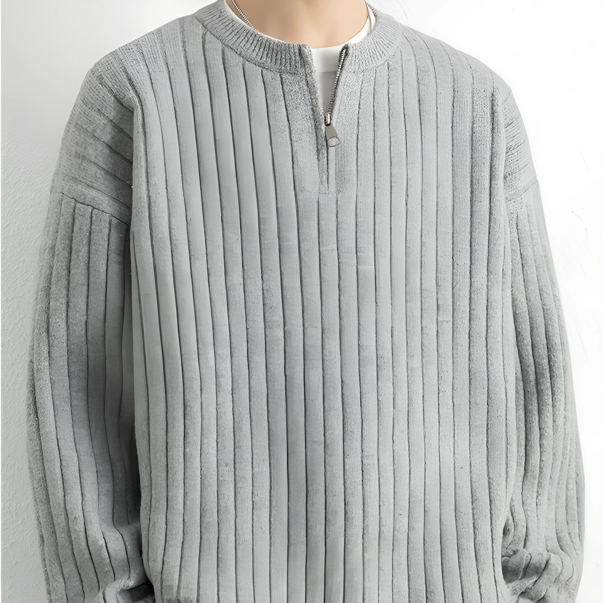 Gray men's loose half-zip textured knit sweater on a hanger.