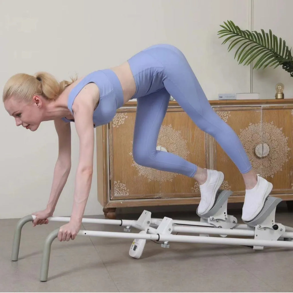 White folding treadmill with integrated climbing frame for home fitness workouts