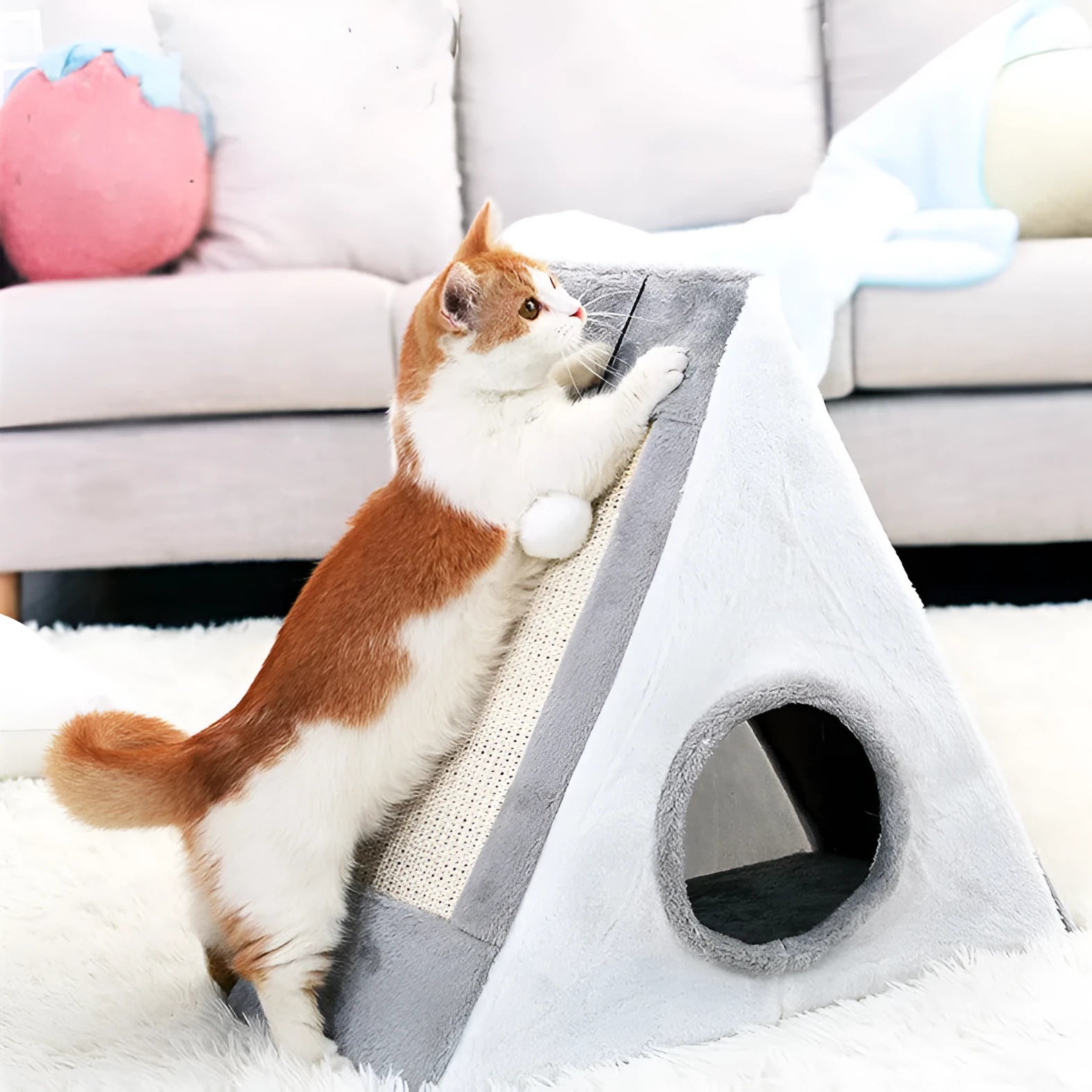 Triangle-shaped cat scratching post and enclosed bed in grey and white colour combination.